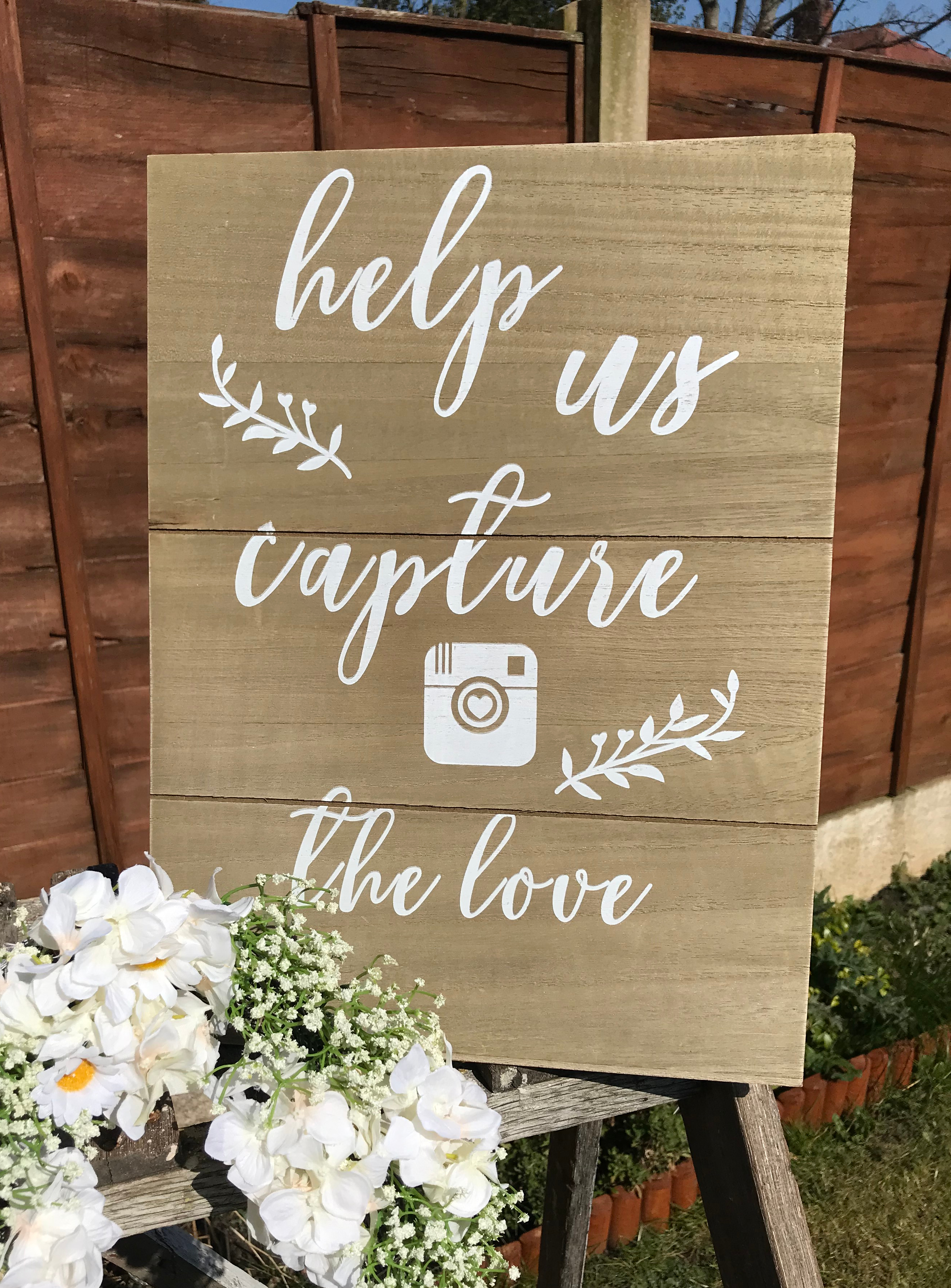 "Help Us Capture The Love" Sign
